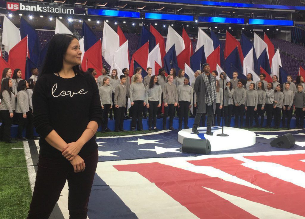 Newark native performs in sign language at Super Bowl Center for