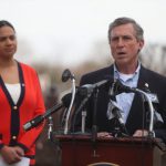 Governor John Carney gives an update on the coronavirus situation in Delaware Wednesday during a press conference outside the Carvel State Building in Wilmington.