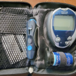 A glucose meter in a pack