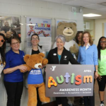 Alex the Autism Bear with folks at the Sussex Family YMCA