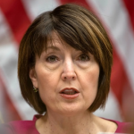Rep. Cathy McMorris Rodgers in front of a U.S. flag